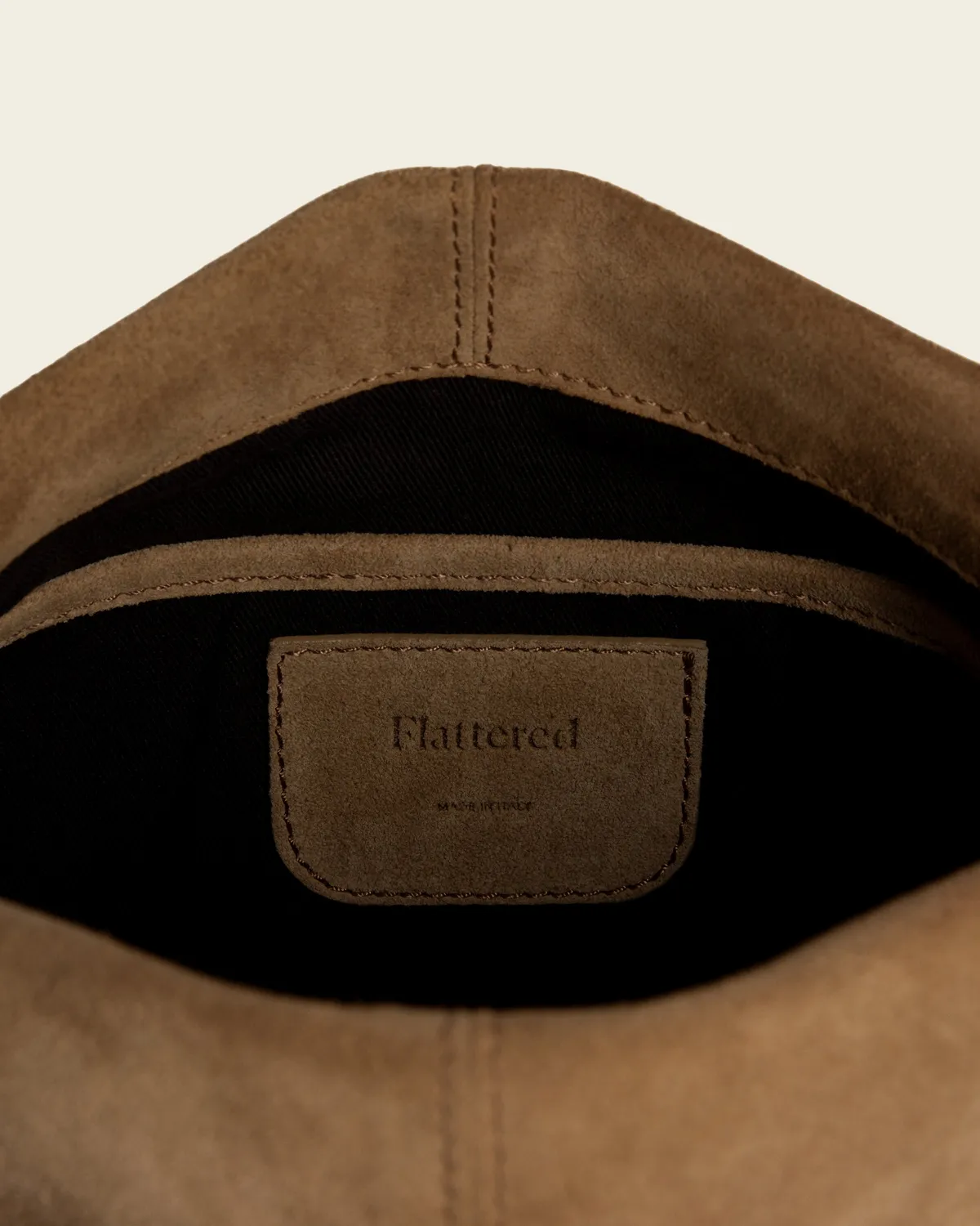 Flattered Clay clutch wet sand suède oversized