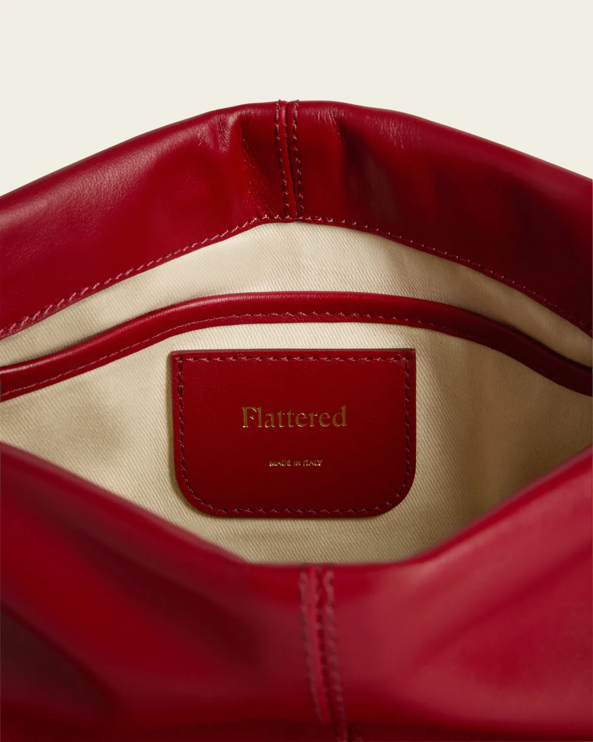 Flattered Clay clutch tomaat leer